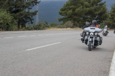 Harley Davidson 'a binerken mutlu sürücü