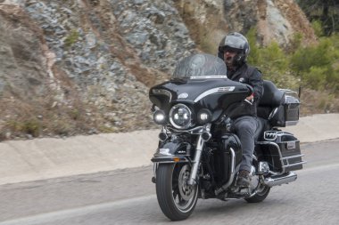 Harley Davidson 'a binerken mutlu sürücü