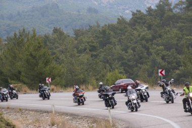 Harley Davidson 'a binerken mutlu sürücü