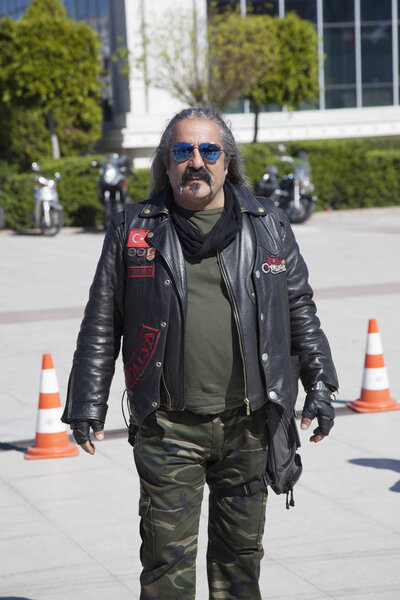 Happy driver riding Harley Davidson