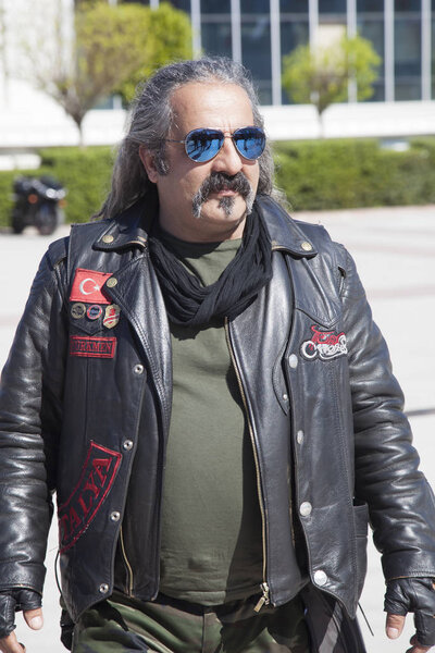 Happy driver riding Harley Davidson