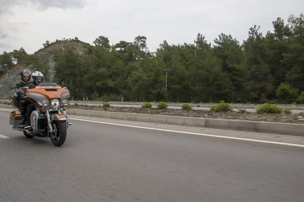 Happy driver riding Harley Davidson — Stock Photo, Image