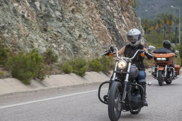 Happy driver riding Harley Davidson — Stock Photo, Image