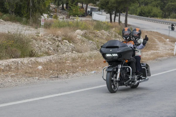 Happy driver riding Harley Davidson — Stock Photo, Image