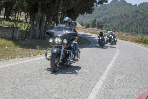 Щасливий водій на Harley Davidson Ліцензійні Стокові Зображення