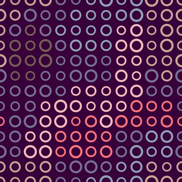 Seamless pattern of rings on a dark background. — Stockový vektor