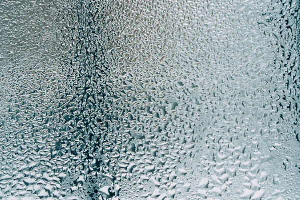 Drops of water on the window glass, close-up — Stock Photo, Image