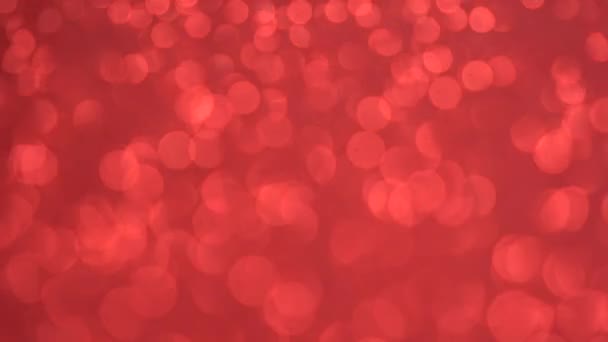 Rode bokeh vakantie getextureerde glitter achtergrond — Stockvideo
