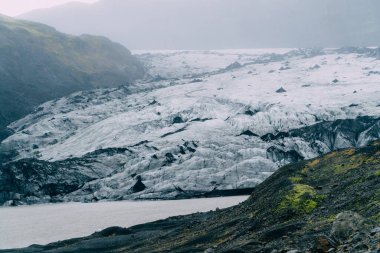 Melting glacier in cloudy weather.