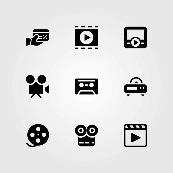 Conjunto de iconos vectoriales tecnológicos. reproductor de películas, cassette y cámara de vídeo — Vector de stock