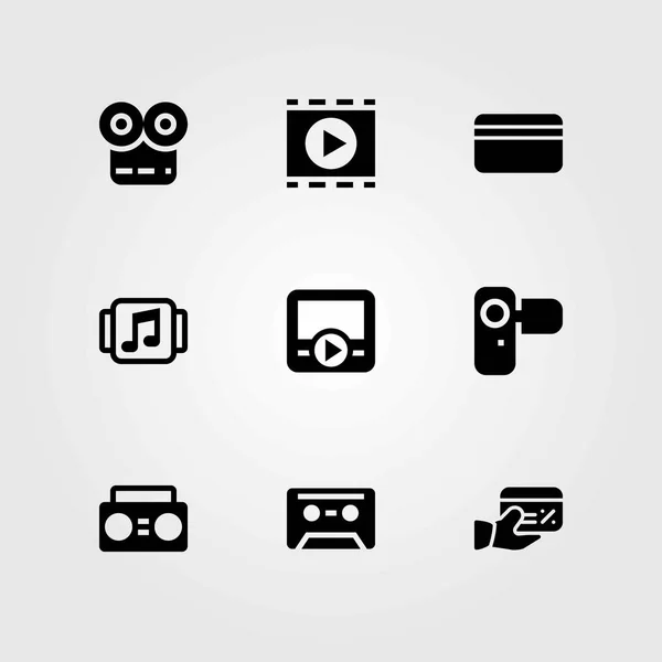 Conjunto de iconos vectoriales tecnológicos. tarjeta de crédito, reproductor de películas y cámara — Vector de stock