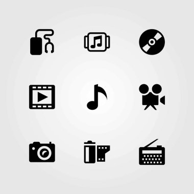 Multimedya vektör simgeler kümesi. nota, film rulo ve video kamera