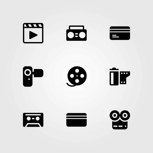 Conjunto de iconos vectoriales tecnológicos. reproductor de películas, cassette y rollo de película — Vector de stock