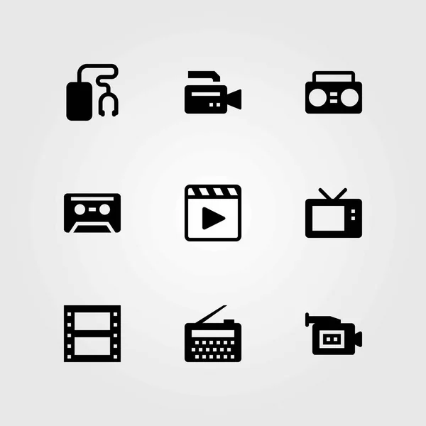 Ensemble d'icônes vectorielles technologiques. rouleau de film, cassette et caméra vidéo — Image vectorielle