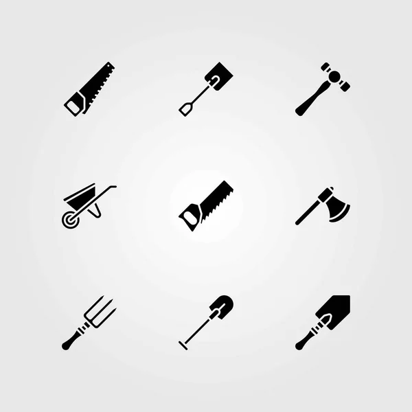 Ensemble d'icônes vectorielles de jardin. scie à main, brouette et bêche — Image vectorielle
