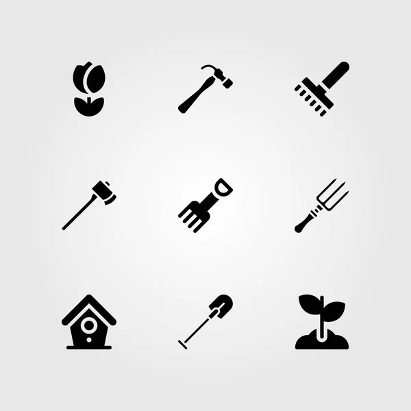Garden vector icon set. fork, tulip, rake and axe — Stock Vector