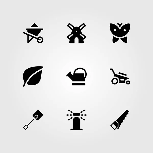 Tuin vector icon set. vlinder, blad, handzaag en grasmaaier — Stockvector