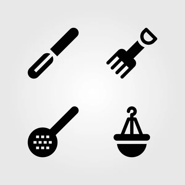 Cocina vector icono conjunto. tenedor, olla, skimmer y pelador — Archivo Imágenes Vectoriales