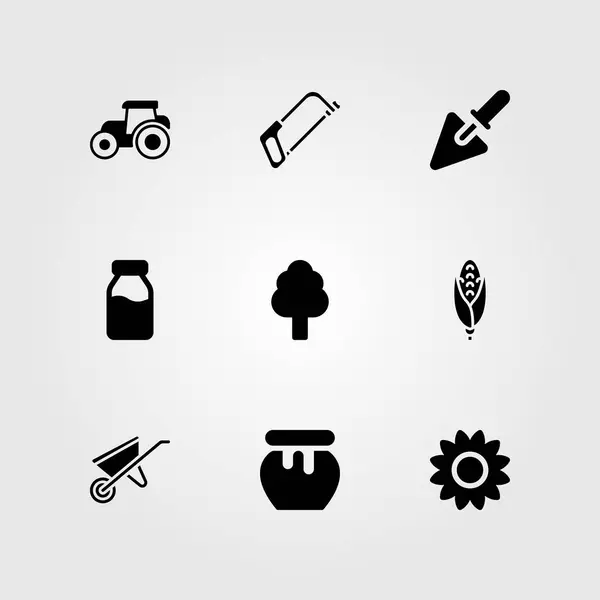 Set di icone vettoriali da giardino. girasole, trattore, miele e albero — Vettoriale Stock