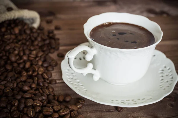 Egy csésze kávé és bab — Stock Fotó