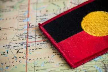Australia map with aboriginal flag clipart