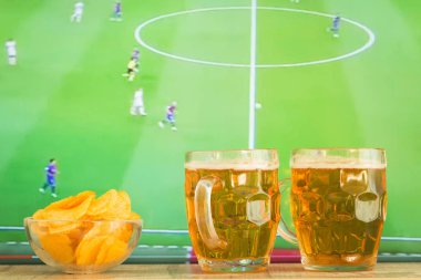 Bira bardağı Tv maç arka plan üzerinde