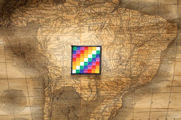 Bolivia.  Country flag on the background of the old map and things associated with Bolivia