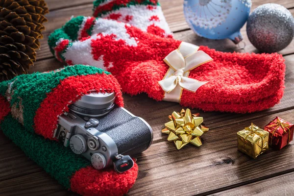 Christmas presents, camera hidden in a sock with Christmas decorations