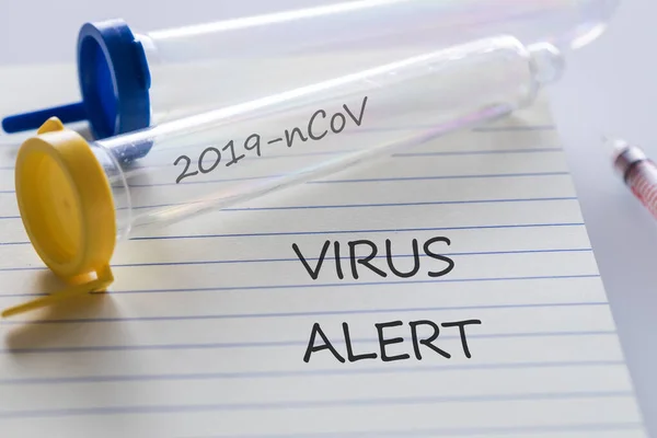 Tabung Laboratorium Dengan Tulisan Coronovirus Notebook Dengan Konsep Virus Alert — Stok Foto