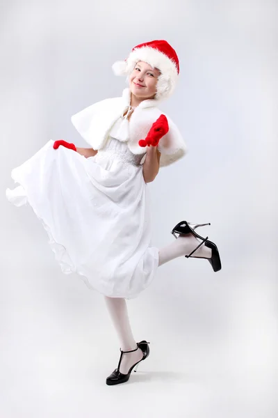 Танцующая маленькая Санта-девочка — стоковое фото