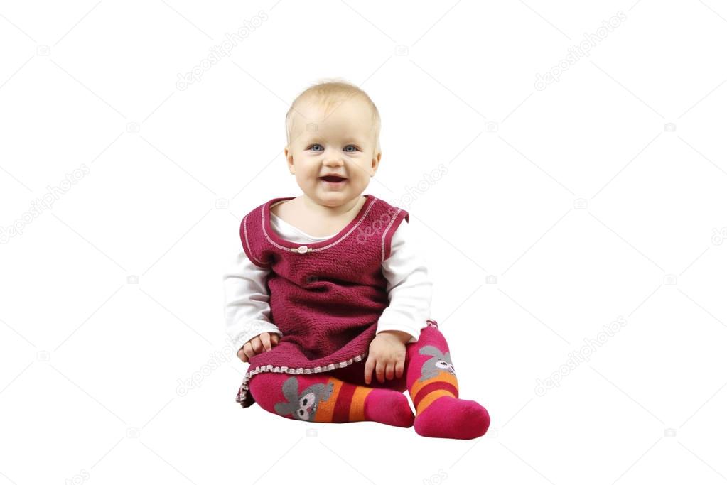 Sitting baby girl wearing on red dress