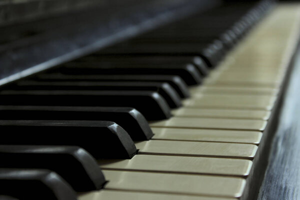 Cropped shot of an old piano.