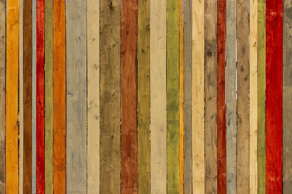 Close-up shot of multicolored wooden wall. — Stock Photo, Image