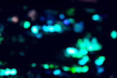 Bulanık yeşil ışık arka planı. Soyut parlak doku arkaplanı.