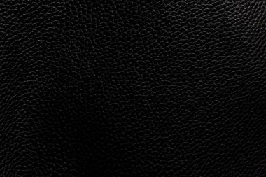 Bulanık deri arka plan, siyah renk. Soyut doku arkaplanı bulanık. Soyut siyah arkaplan.