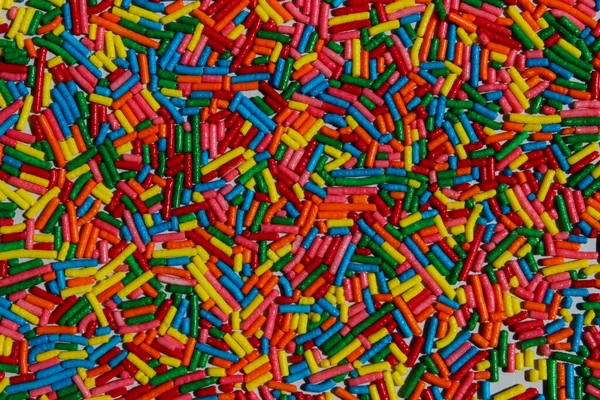 テキストのための多くのコピースペースとカラフルなキャンディーの背景 色とりどりのお菓子がたくさん 抽象的な色彩パターン — ストック写真