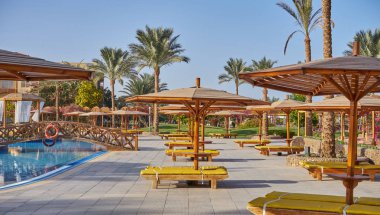 Desert Rose Resort plajda topraklarında görüntülemek