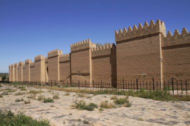 Restored ruins of ancient Babylon, Iraq. In front of  the wall is procession street which leads to the Ishtar gate. clipart