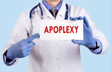 Doktor bir kartı felç adıyla tutar. Seçici odak. Tıp kavramı.