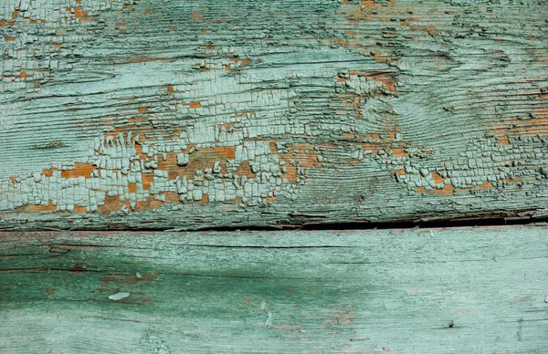 Изумрудный оттенок цвета трещины краски пилинг на текстуре дерева — стоковое фото