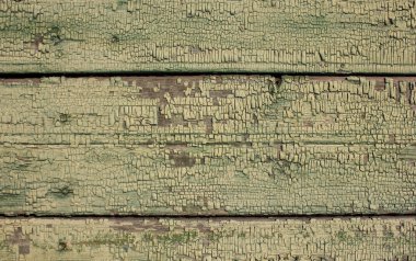 kırık boya ahşap texture.old ahşap plakalar üzerinde peeling yeşil hardal gölge renkli.