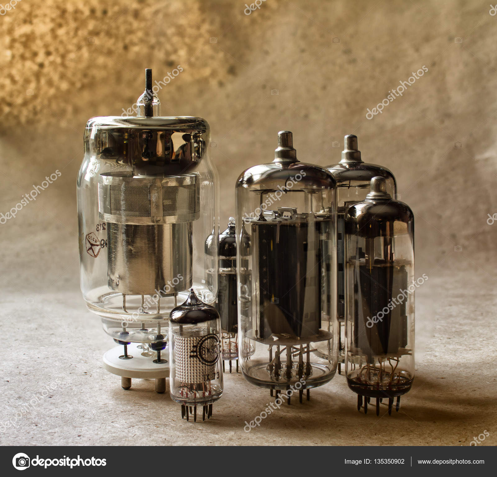 Vertical Composition Of Old Radio Lamps On Kraft Paper In Warm Tones Vertical Composition Of Old Radio Lamps On Kraft Paper In Warm Tones Vintage Electronic Background