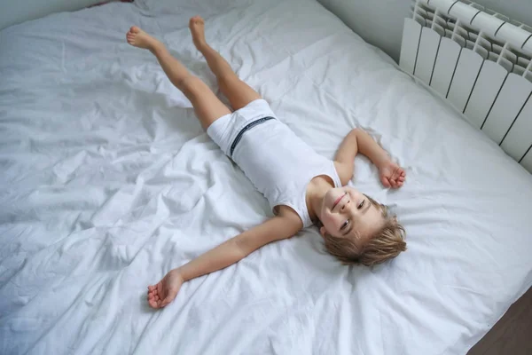 View Little Boy Having Fun Lying Bed — Stock Photo, Image