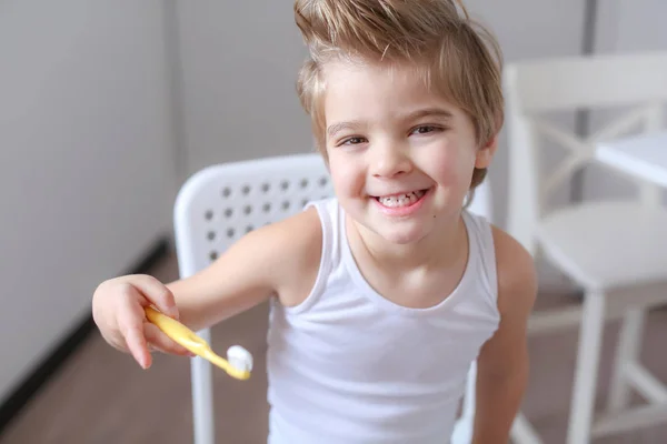 Portrait Funny Little Boy Holding Tooth Brush Smiling Sitting White — Stock Photo, Image