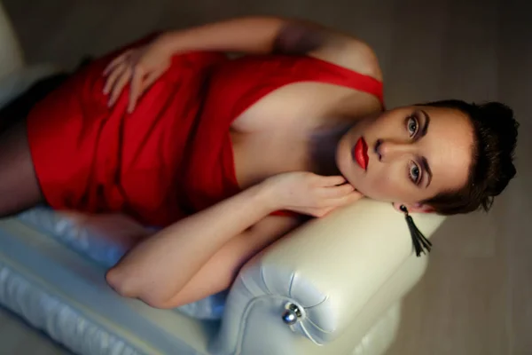 Woman close up in red dress with open neckline — 스톡 사진