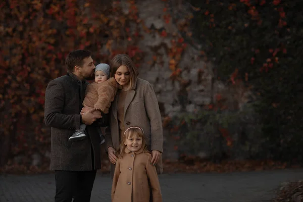 Family photo in warm dark tones. — Stock Photo, Image