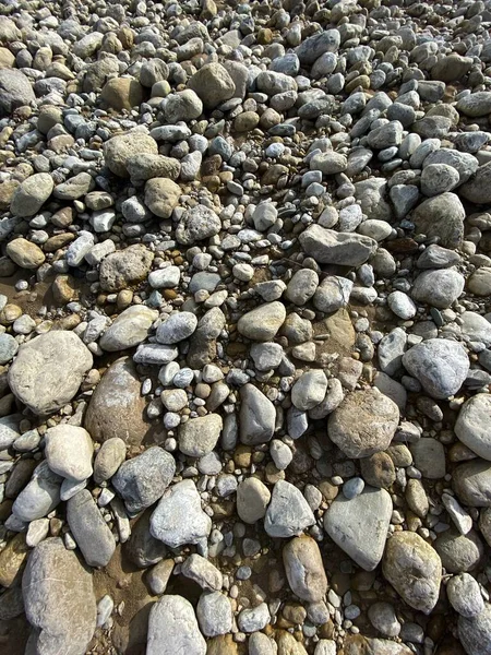 River stones sruned by jets of water — Stock Photo, Image