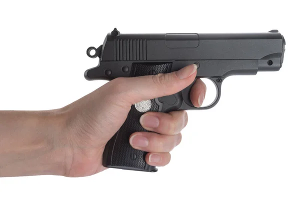 Siyah silah, kadın eli, beyaz el izolasyonu.