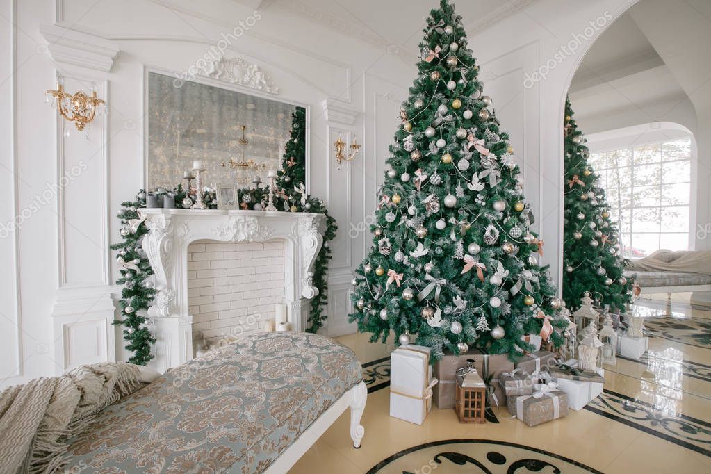 Christmas morning. classic luxury apartments with a white fireplace ...