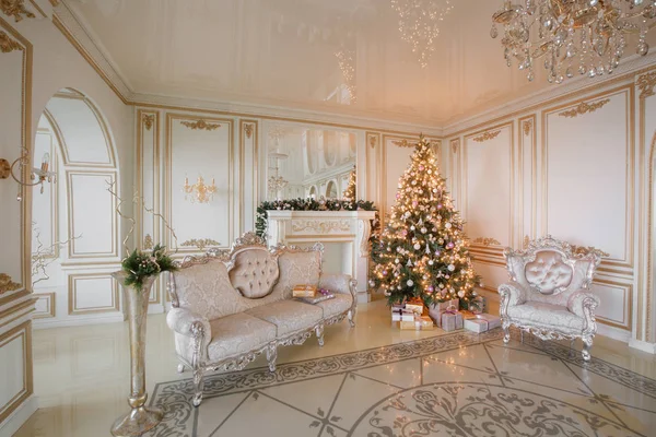 Calm image of interior Classic New Year Tree decorated in a room with fireplace